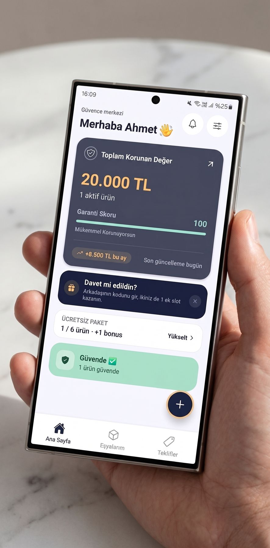 Elde tutulan telefonda Garantify Güvence merkezi: toplam korunan değer 20.000 TL, garanti skoru 100